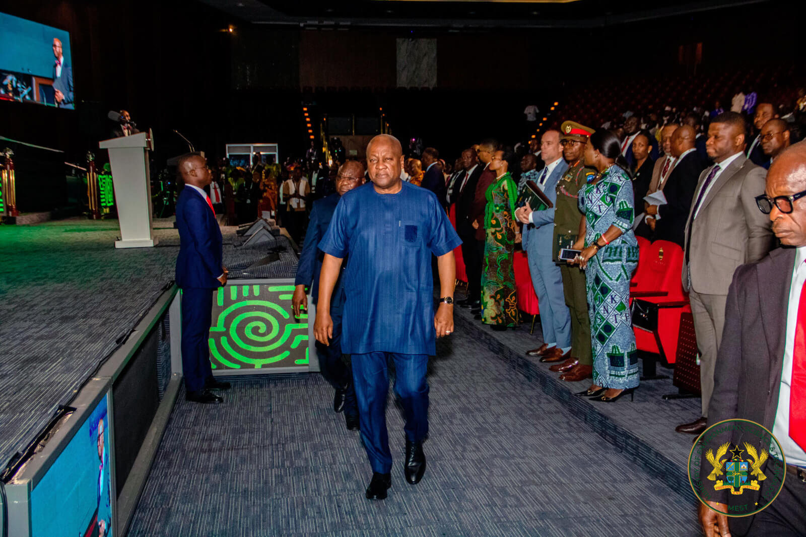 H.E John Dramani Mahama walking up stage at the event.
