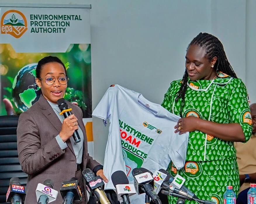 The Chief Executive Officer of the EPA, Prof. Nana Ama Browne Klutse, presents a branded EPA shirt to Hon. Dr Zanetor Agyeman-Rawlings during the Minister's visit to the Authority.